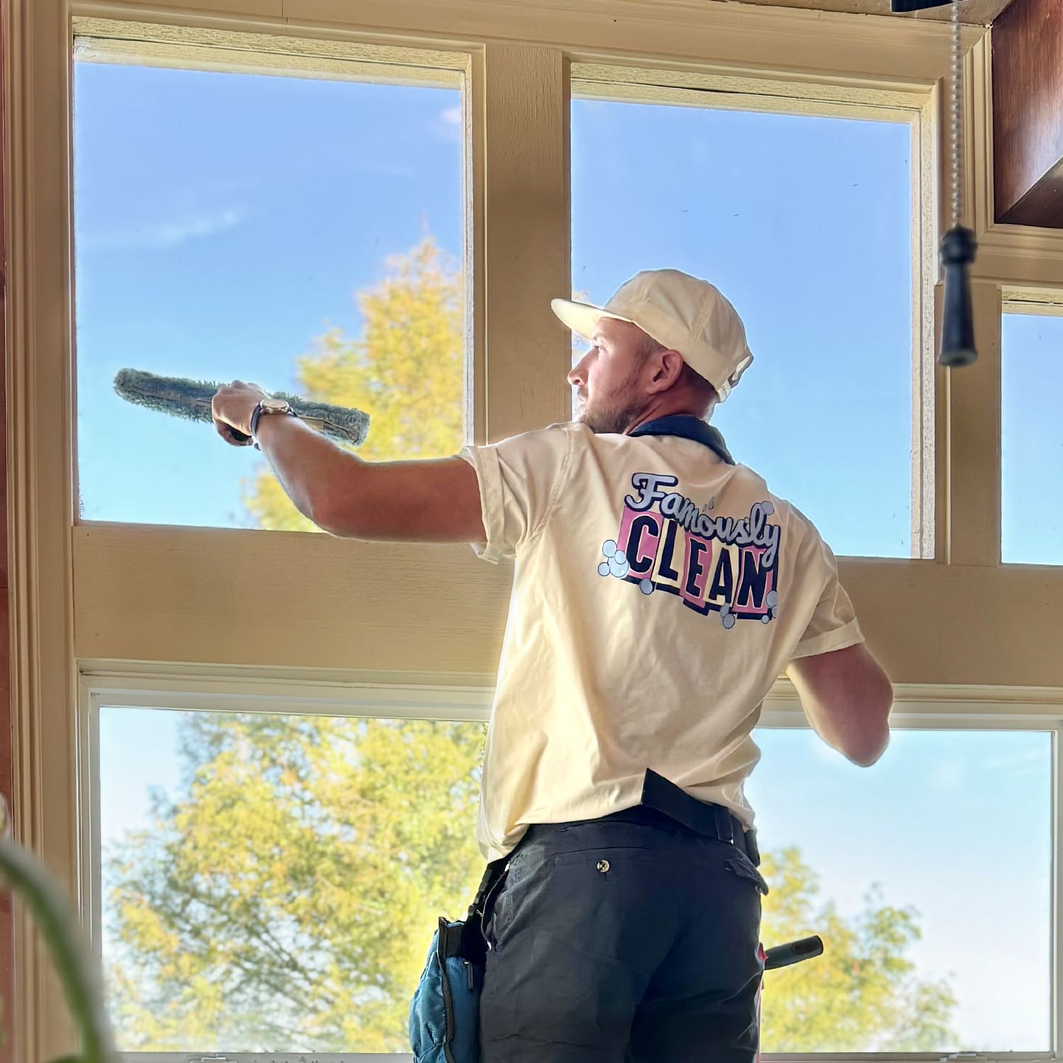 Famously Clean washing interior windows in Orlando